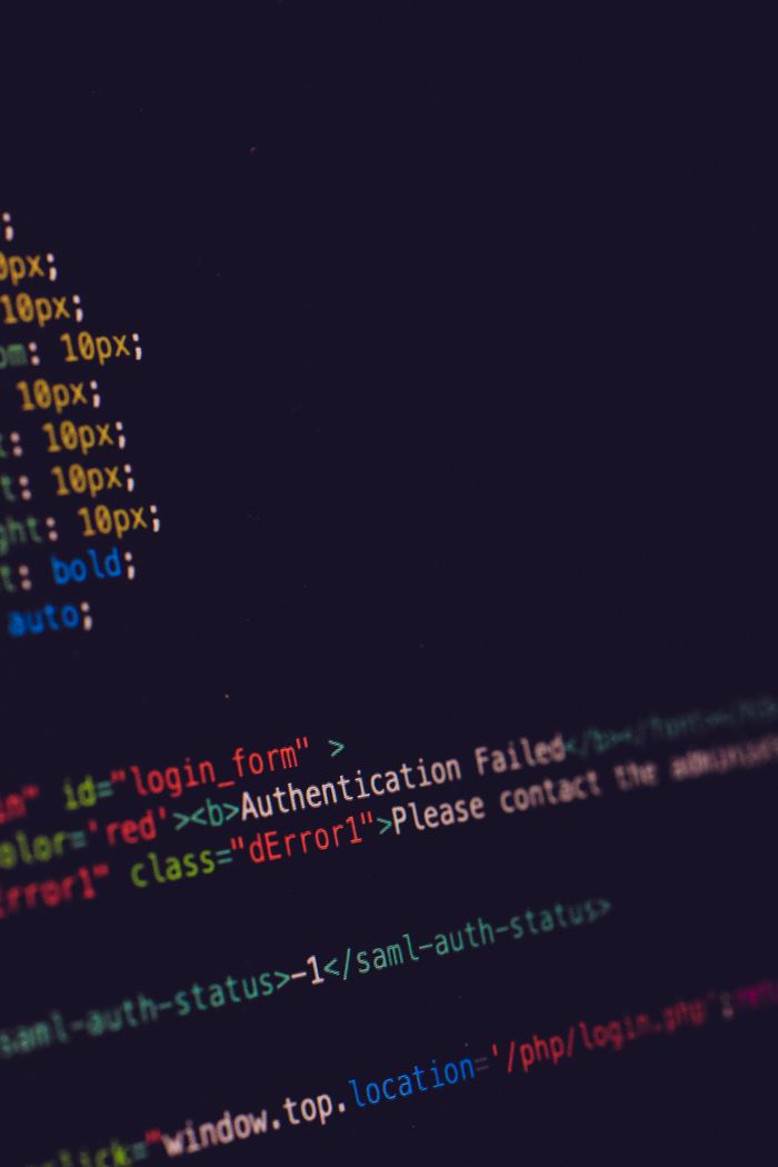 process-img Close-up of programming code on a dark screen, highlighting software development concepts.